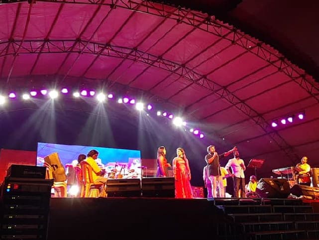 Originals Orchestra performing on a festival stage